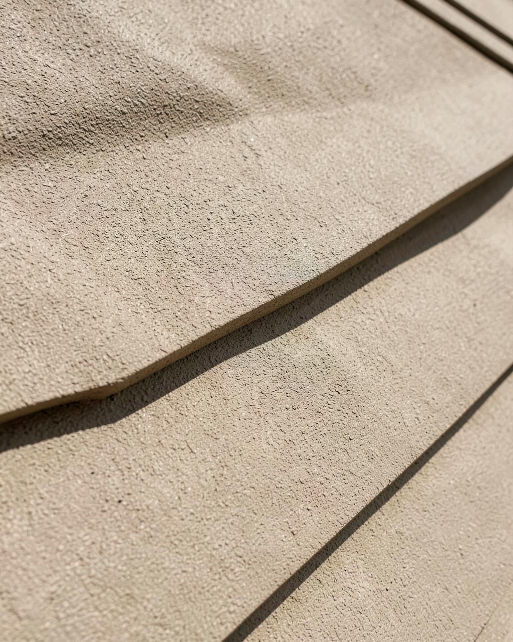 Close-up of lap siding boards in warm light